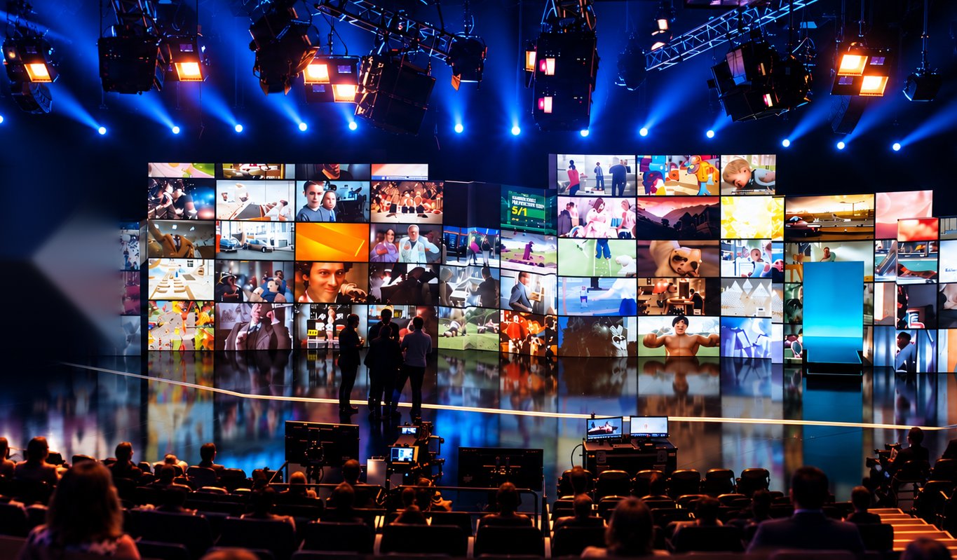 ITV Upfronts stage set, with the ITV Upfronts branding shown on the video wall behind the presenters.